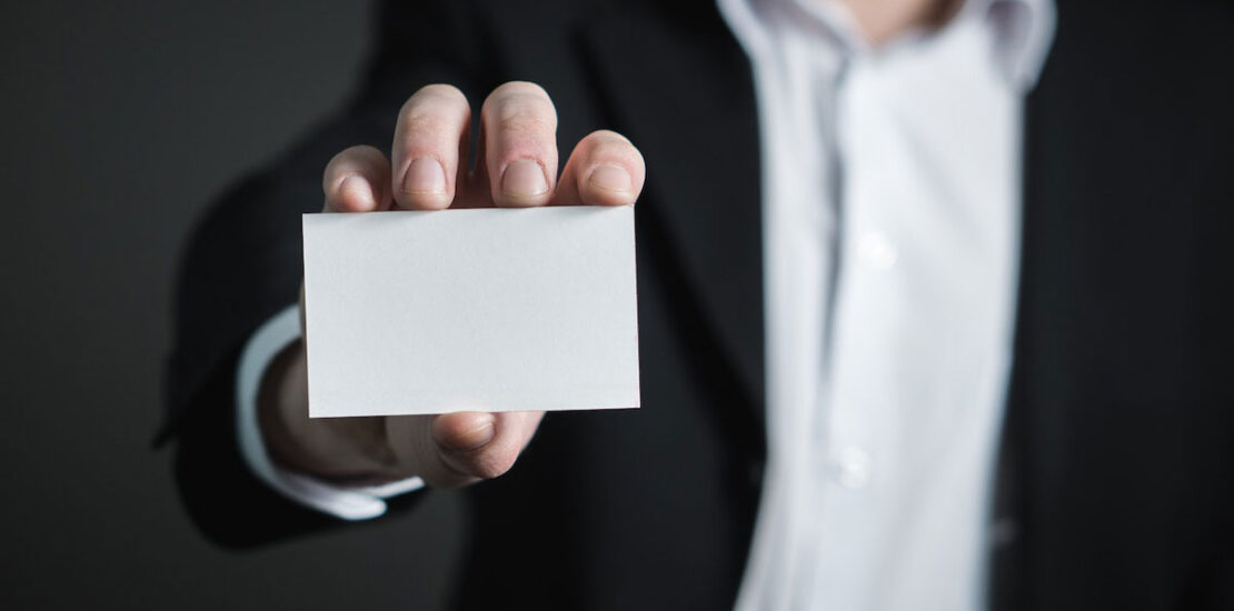 A criminal defense lawyer holding a blank paper, representing identity theft.