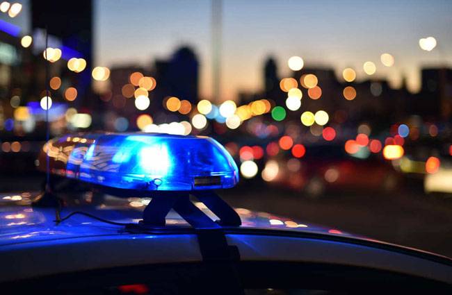 Police siren on, suggesting a possible hit-and-run offence.
