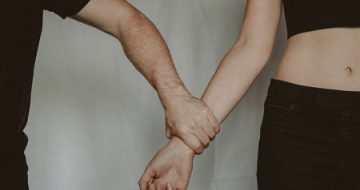 A man grabbing a woman